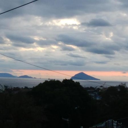 Отель 築100年の宿【はぶの家】 Oshima Экстерьер фото